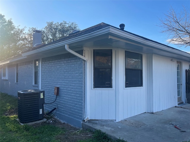 view of property exterior with central air condition unit