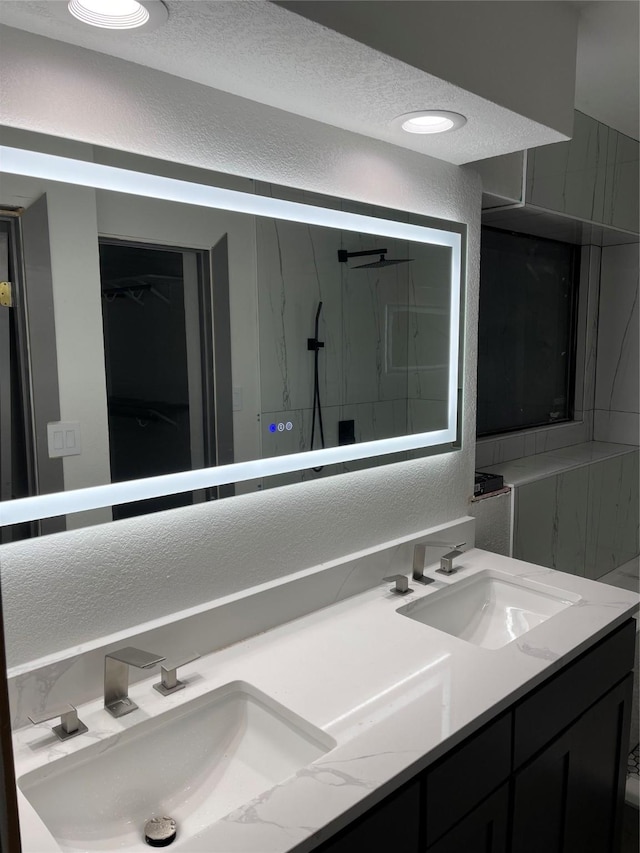 bathroom featuring vanity and walk in shower