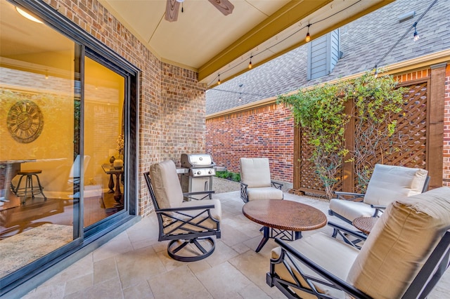 view of patio / terrace featuring ceiling fan, area for grilling, and an outdoor living space