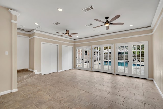 empty room featuring french doors, ceiling fan, and ornamental molding