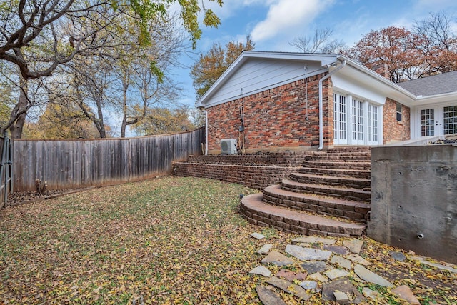 view of home's exterior with french doors