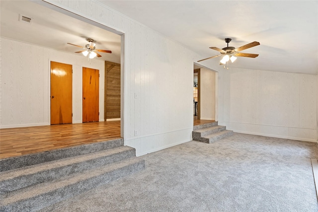 unfurnished room with ceiling fan and hardwood / wood-style floors