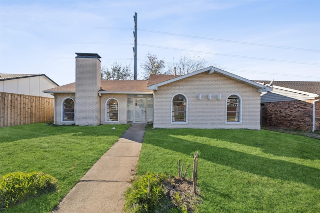 ranch-style house with a front yard