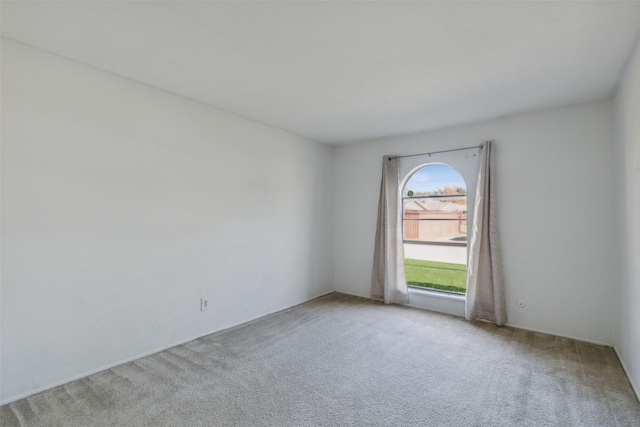 view of carpeted spare room