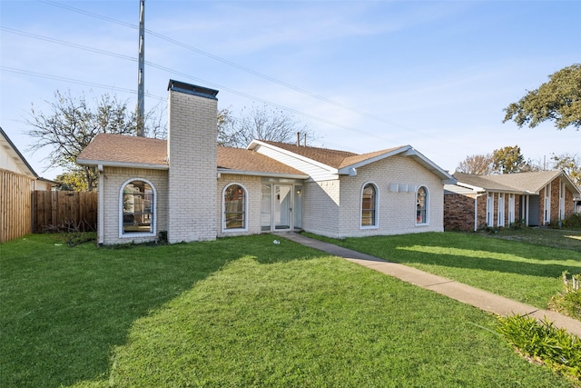 ranch-style house with a front yard