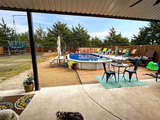 view of patio / terrace with a pool side deck