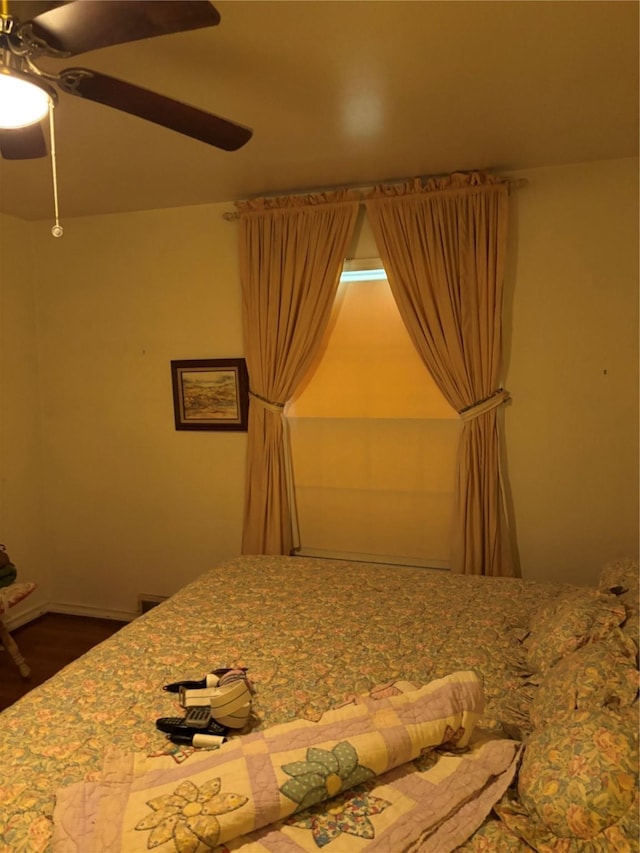 unfurnished bedroom featuring ceiling fan