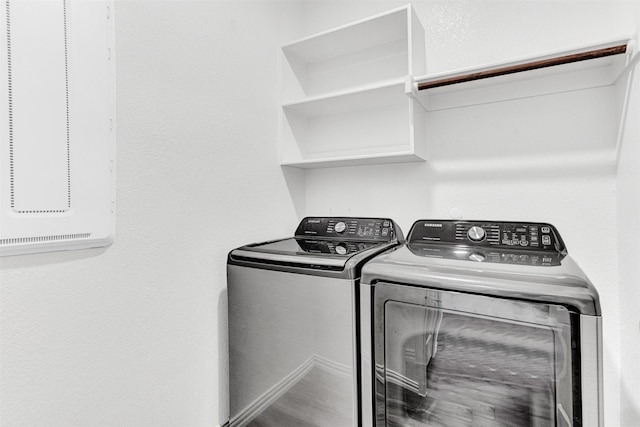 laundry area with washer and dryer