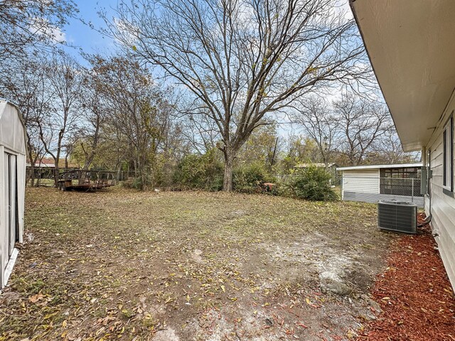 view of yard featuring central AC unit