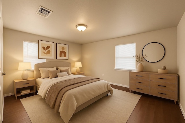 4613 Crenshaw Ave, Fort Worth, TX 76105 - bedroom with baseboards and dark wood-style floors