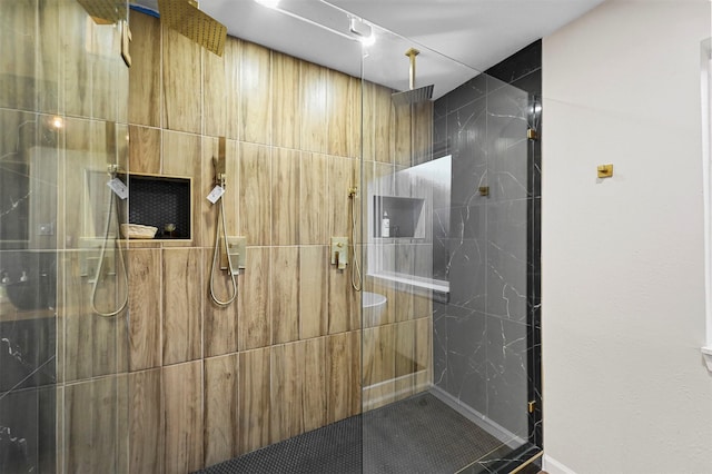 bathroom featuring tiled shower