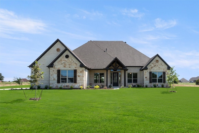 french provincial home featuring a front lawn