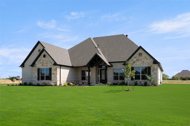 view of front of home with a front yard