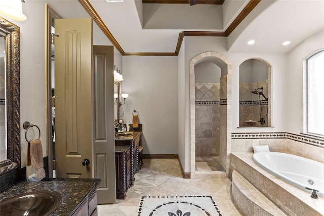 bathroom featuring vanity, plenty of natural light, crown molding, and plus walk in shower