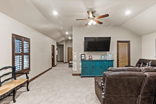 living room with lofted ceiling, light carpet, and ceiling fan