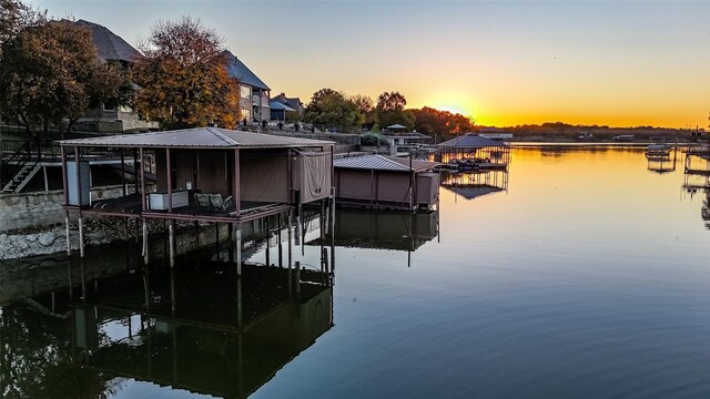 view of dock with a water view