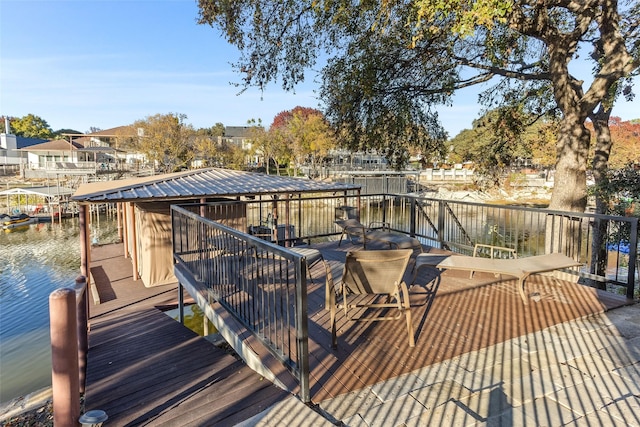 dock area featuring a water view