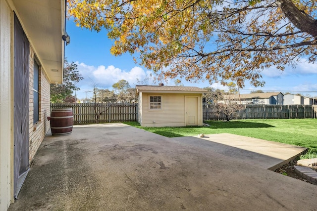 view of patio / terrace with a shed