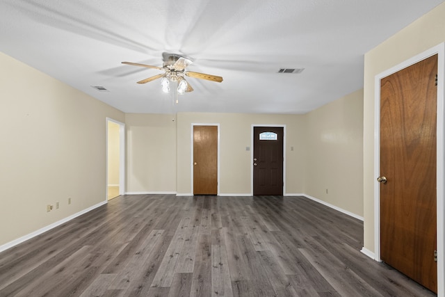 interior space featuring dark hardwood / wood-style flooring and ceiling fan