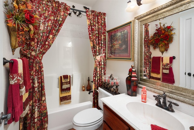 full bathroom featuring vanity, shower / tub combo, and toilet