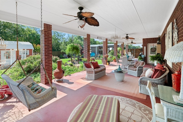 view of patio / terrace featuring ceiling fan