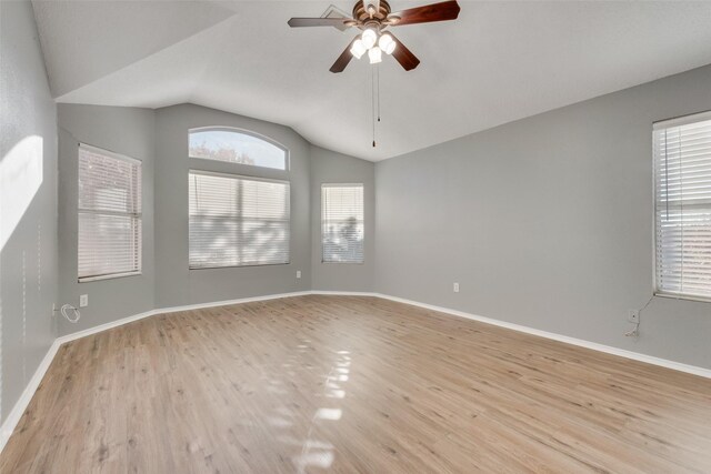 spare room featuring plenty of natural light and light hardwood / wood-style floors