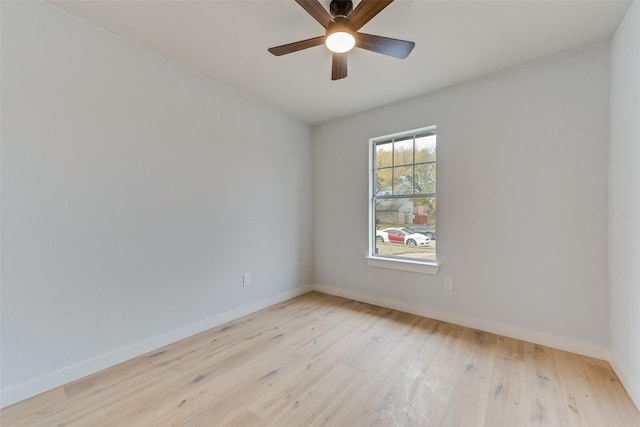 empty room with light wood-type flooring and ceiling fan