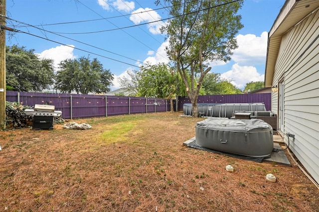 view of yard featuring a pool