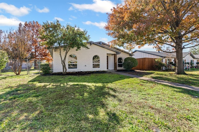 view of front of house with a front lawn