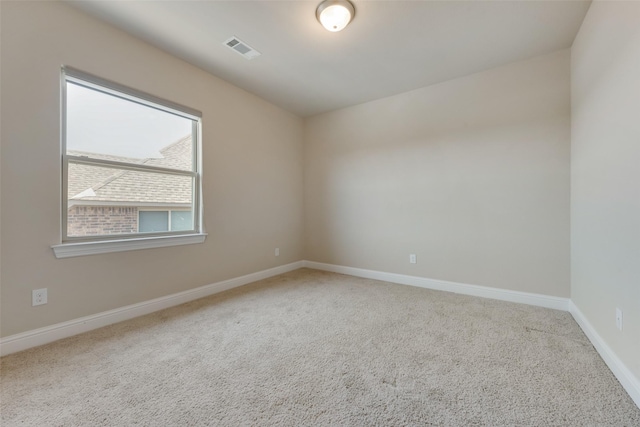 unfurnished room with carpet floors