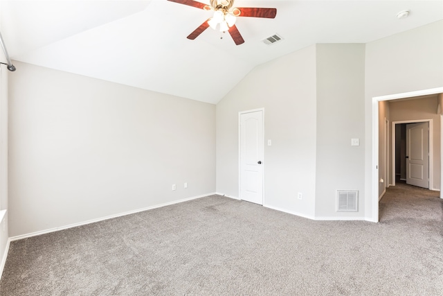 unfurnished room with carpet flooring, ceiling fan, and vaulted ceiling