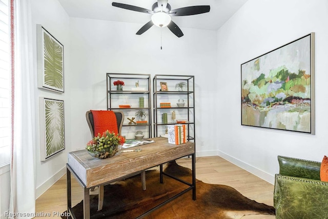 office area featuring ceiling fan and light wood-type flooring