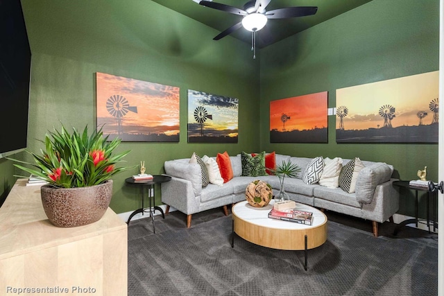 living room with ceiling fan and carpet flooring