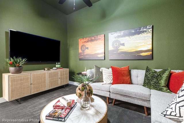 carpeted living room featuring ceiling fan