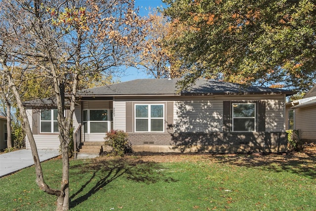 ranch-style home with a front yard