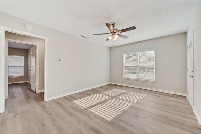 unfurnished room featuring ceiling fan and light hardwood / wood-style flooring