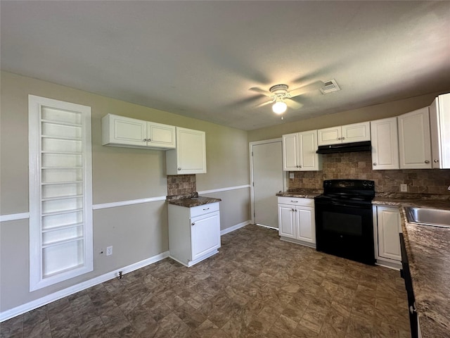 kitchen with black electric range oven, decorative backsplash, sink, and white cabinets