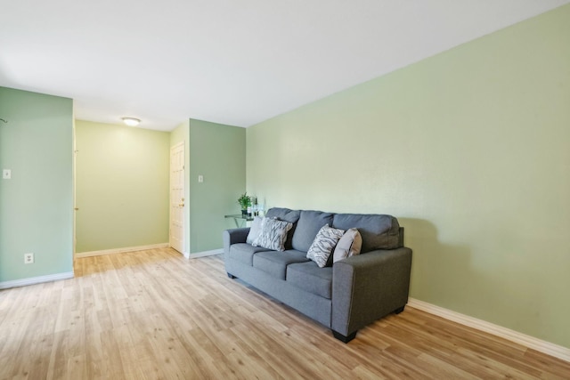 living room with light hardwood / wood-style flooring