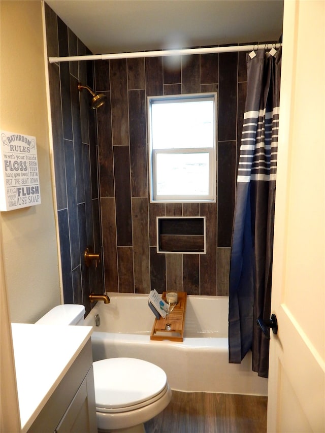 full bathroom with vanity, toilet, and shower / bath combo with shower curtain