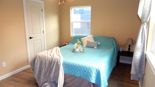 bedroom featuring dark hardwood / wood-style floors