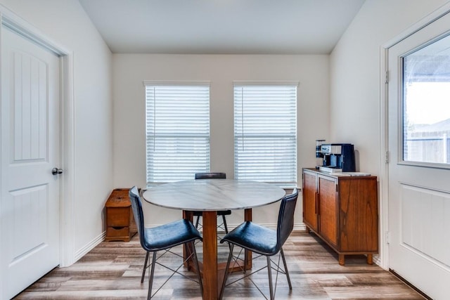 dining space featuring light hardwood / wood-style floors