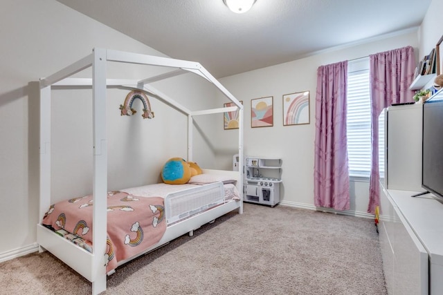 bedroom featuring multiple windows and carpet