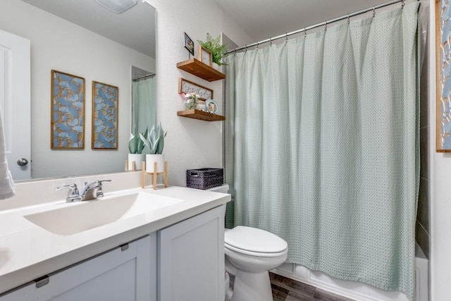 full bathroom featuring vanity, hardwood / wood-style flooring, toilet, and shower / bathtub combination with curtain