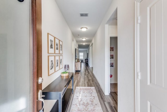 hall featuring light hardwood / wood-style floors