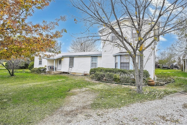 exterior space featuring a front yard