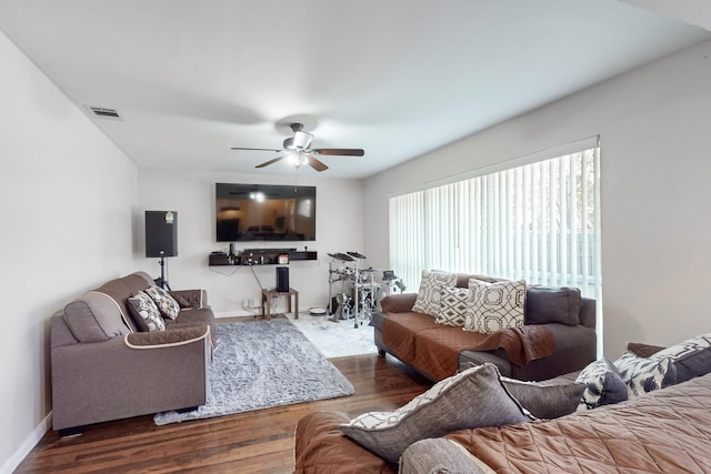 living room with ceiling fan and hardwood / wood-style flooring