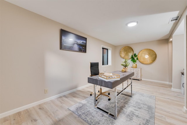 home office featuring light hardwood / wood-style flooring