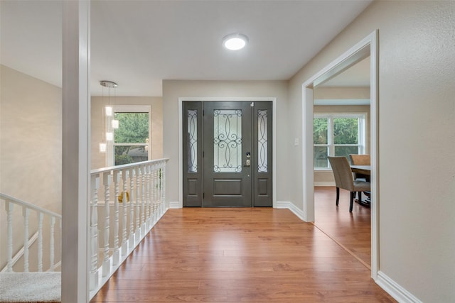 entrance foyer featuring light wood-type flooring