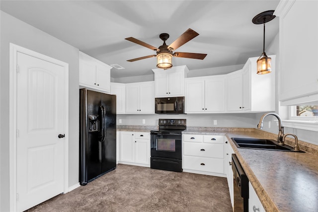 kitchen featuring ceiling fan, black appliances, pendant lighting, white cabinets, and sink