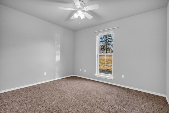 empty room with carpet and ceiling fan